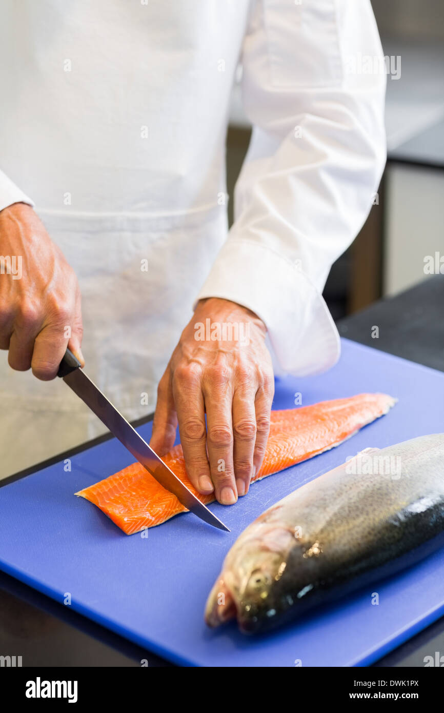 Cutting fish hi-res stock photography and images - Alamy