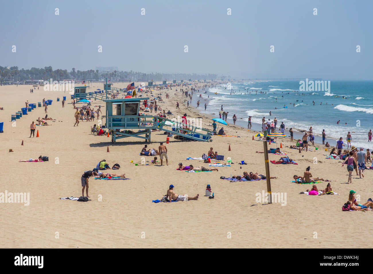People sunbathing and swimming at Malibu Beach Stock Photo