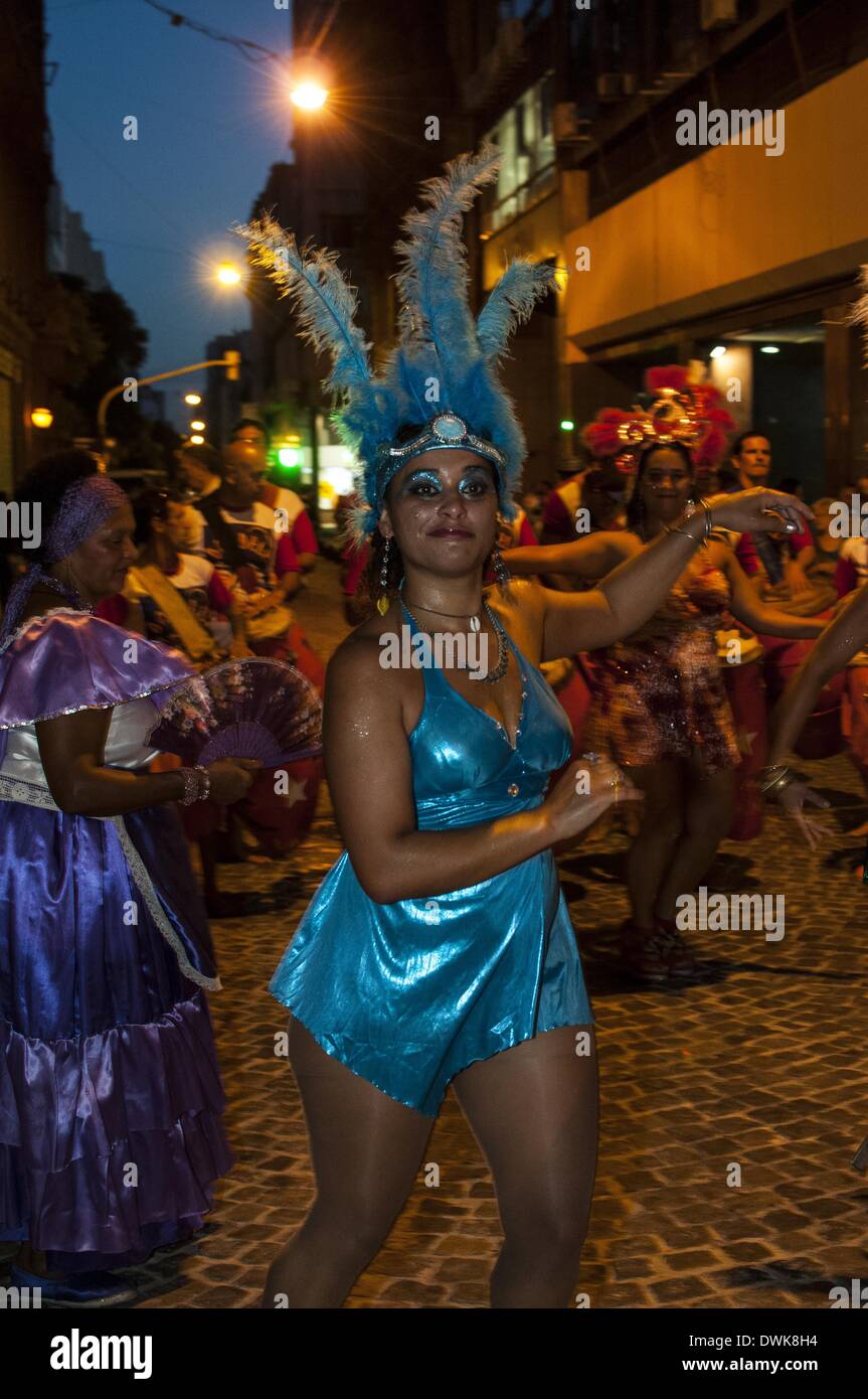 Buenos Aires, Buenos Aires, Argentina. 8th Mar, 2014. As the carnaval season comes to an end, the streets of Buenos Aires bear witness to the third Afrodescendants' Carnaval in San Telmo neighbourhood. Thousands of people celebrate the city's rich and often overlooked African cultural heritage as traditional comparsas dance through the streets to the beat of the candombe drums. © Patricio Murphy/ZUMAPRESS.com/Alamy Live News Stock Photo