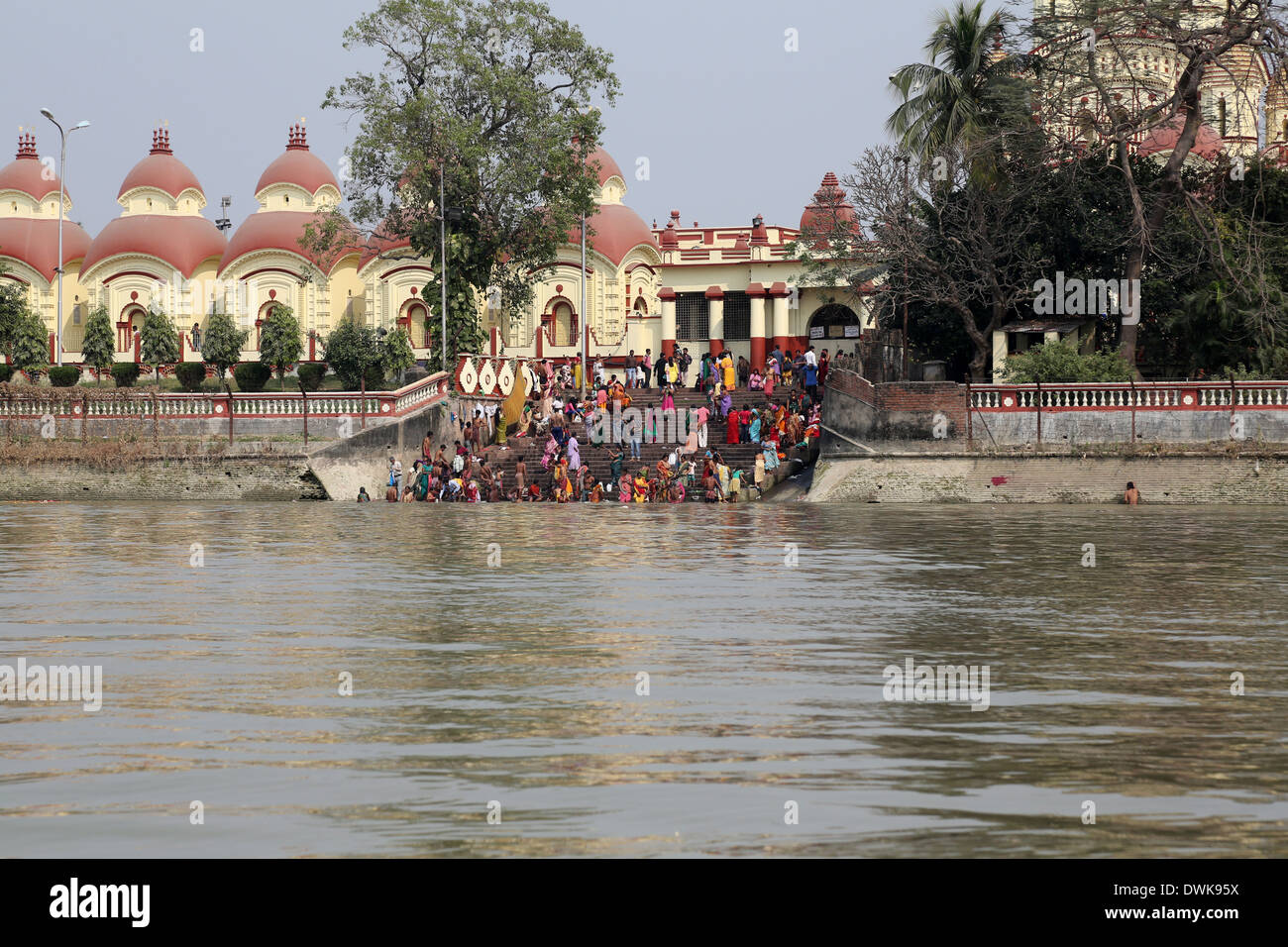 Morning ritual on the Hoogly(Ganges) river in the ghat near the Dakshineswar Kali Temple, Kolkata, West Bengal, India Stock Photo