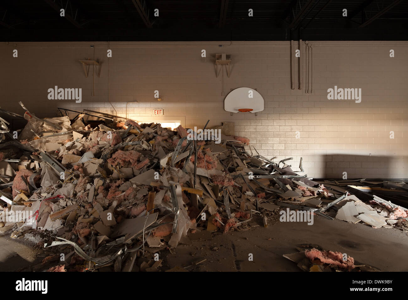 Dry wall and other debris inside the gymnasium of the Harvest Bible Chapel undegoing demolition in Oakville, Ontario, Canada. Stock Photo