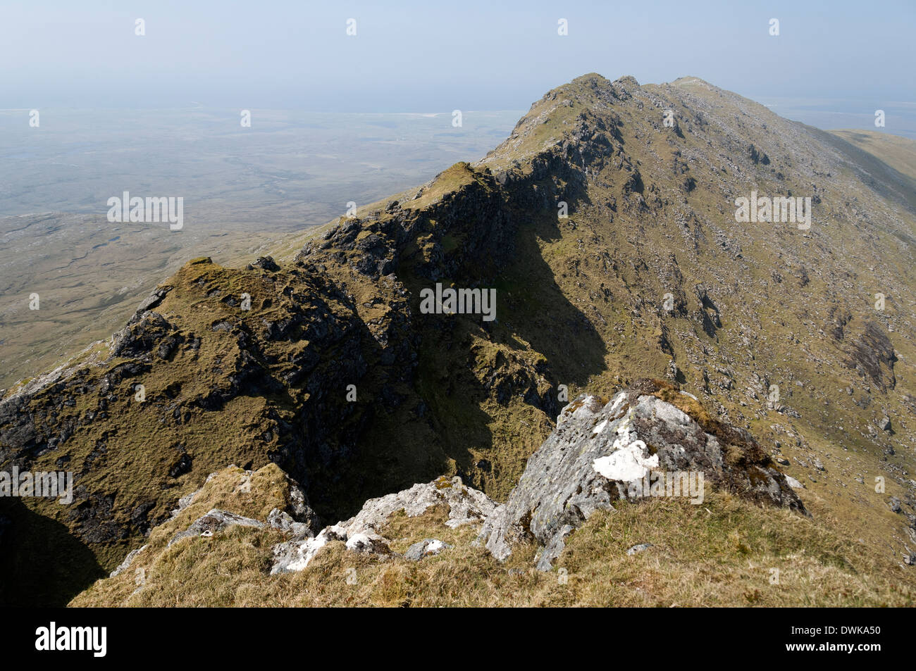 The summit ridge of Beinn Mhor looking west from near the summit, South Uist, Western Isles, Scotland, UK Stock Photo