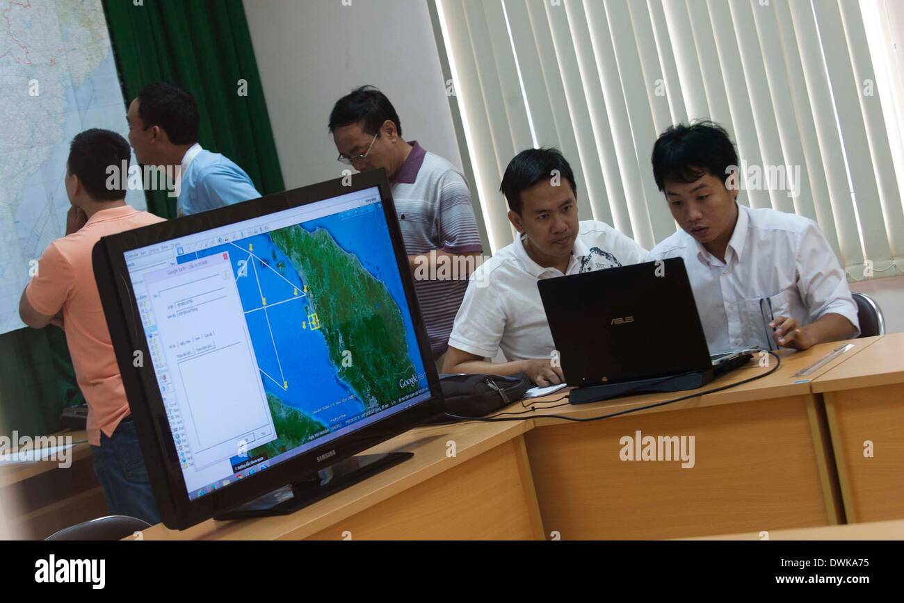 Phu Quoc Island, Vietnam. 11th Mar, 2014. Staff members work at the rescue command office for the missing Malaysia Airlines flight MH370 on Phu Quoc Island, Vietnam, March 11, 2014. Credit:  Lui Sui Wai/Xinhua/Alamy Live News Stock Photo