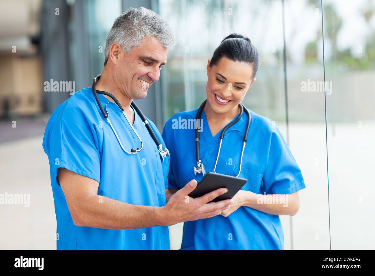 professional healthcare workers using tablet computer Stock Photo