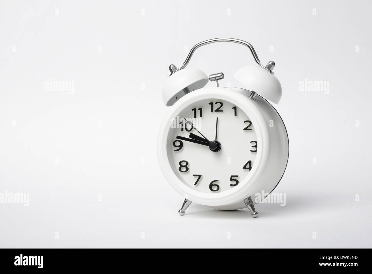 Classic Designed White Colored Table Clock Stock Photo