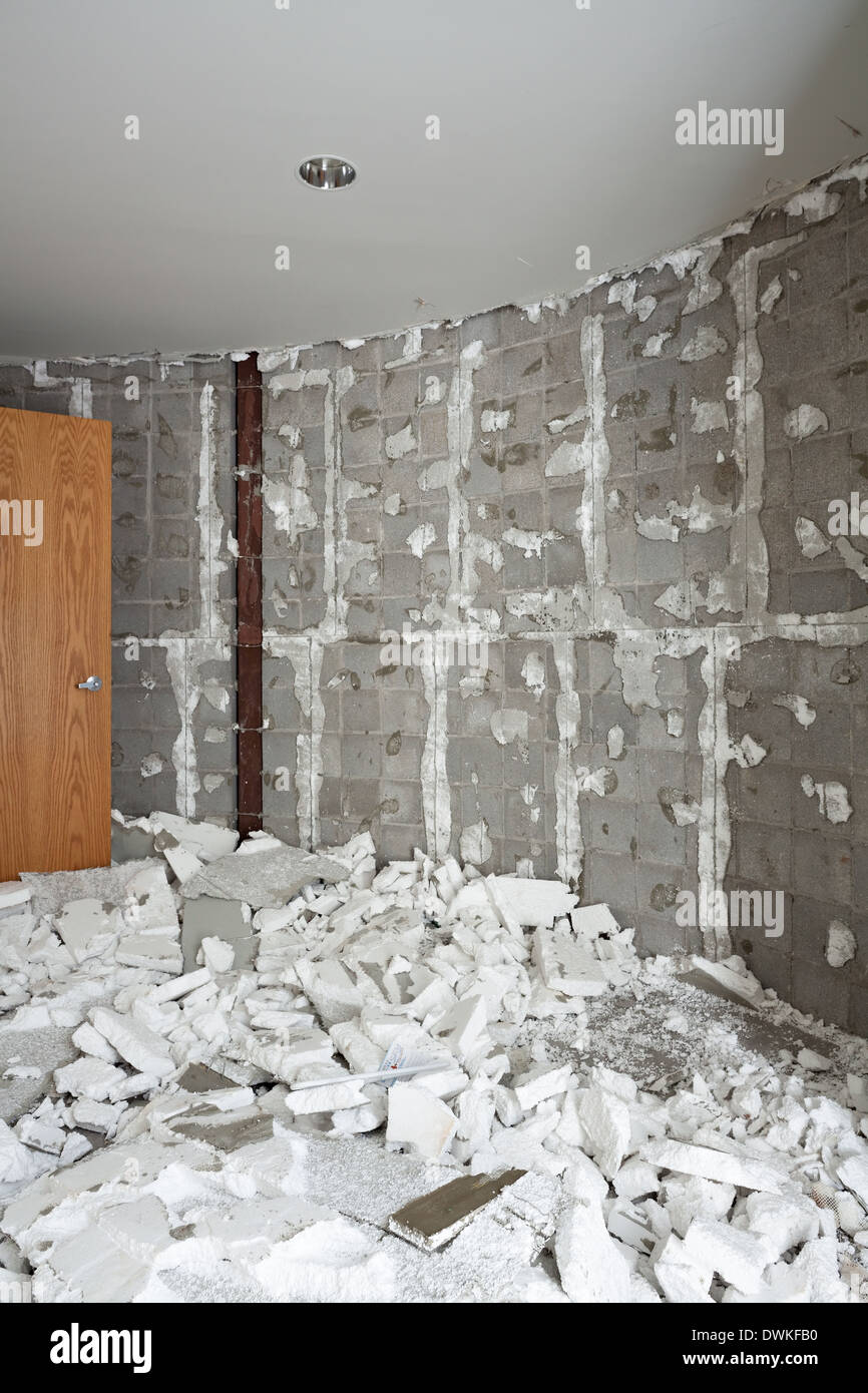 Styrofoam insulation litters the ground in a room inside an abandoned church. Harvest Bible Chapel, Oakville, Ontario, Canada. Stock Photo
