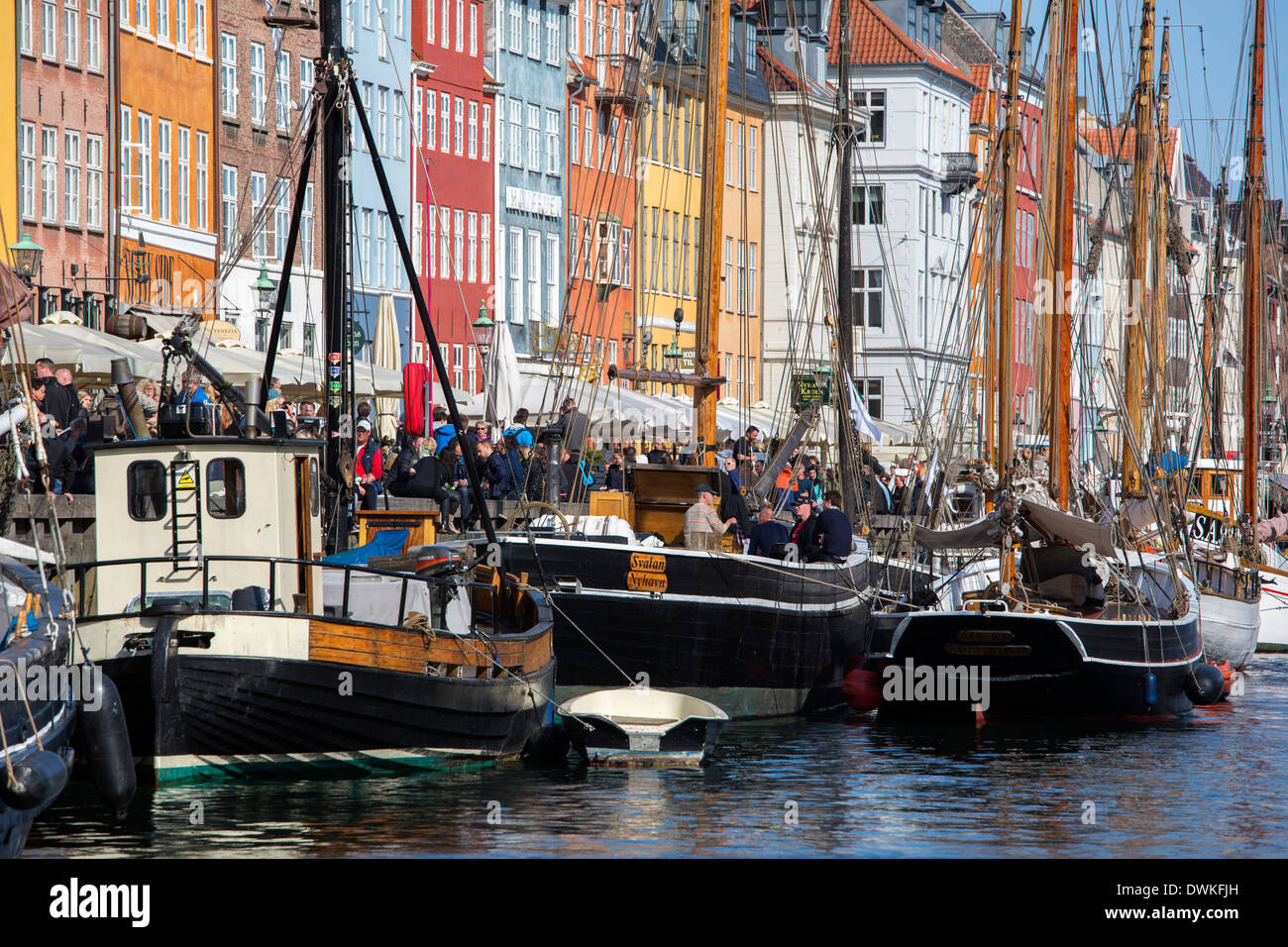 Sailing boats moored in Nyhavn in Copenhagen Stock Photo