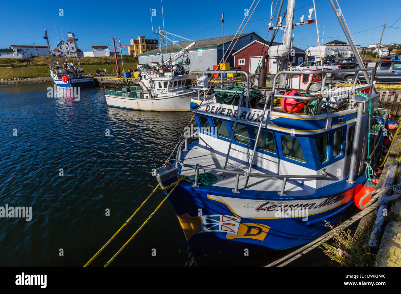 Fishing vessels inside the harbor at Bonavista, Newfoundland, Canada, North America Stock Photo