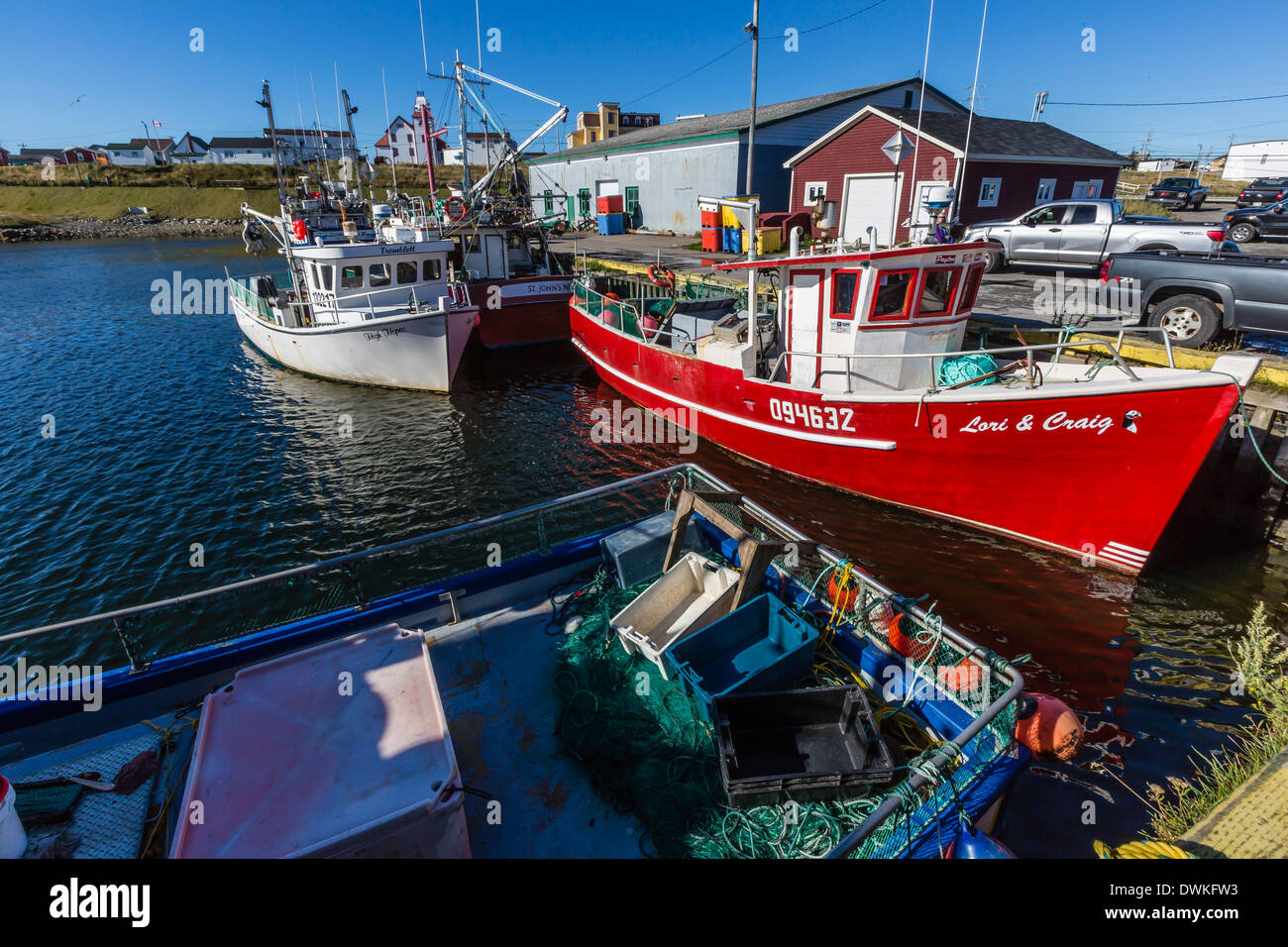 Fishing vessels inside the harbor at Bonavista, Newfoundland, Canada, North America Stock Photo