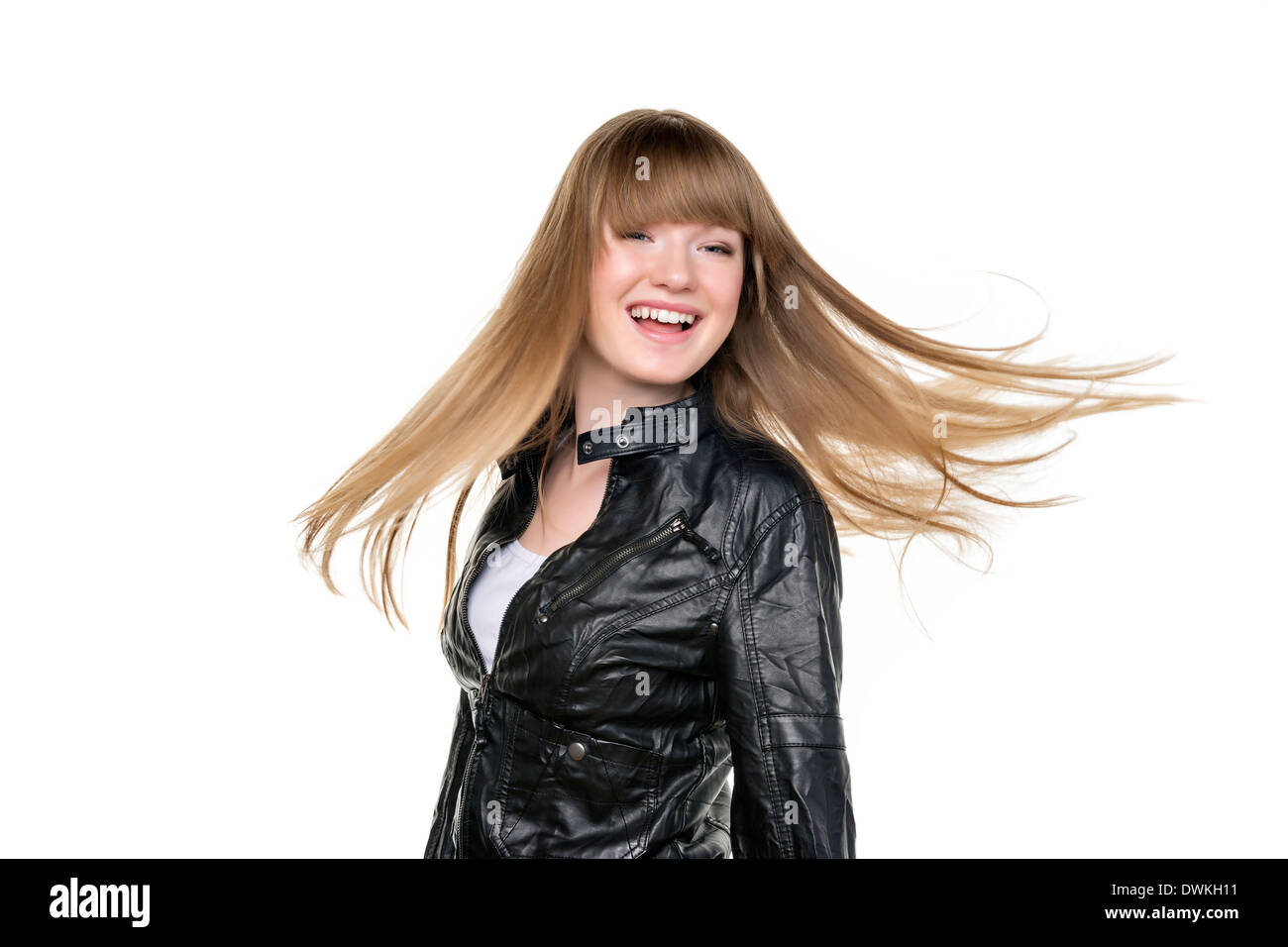 Blond girl with a black leather jacket and waving blond hair Stock Photo