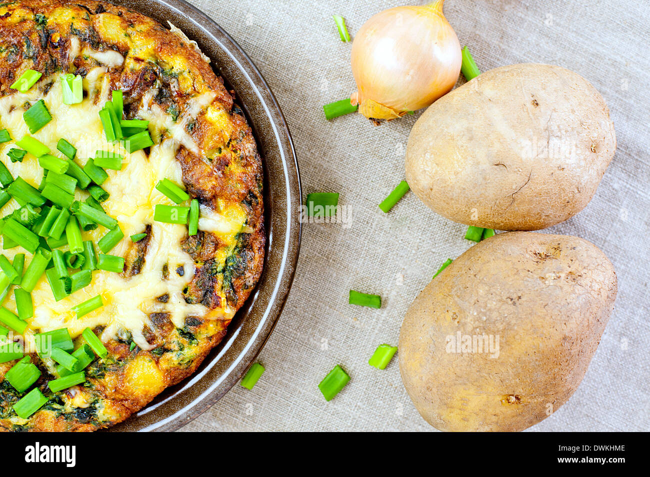 spanish tortilla made of potatoes, eggs and spinach Stock Photo - Alamy