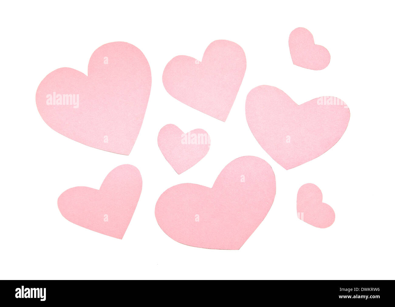 Various pink paper hearts on isolated white background Stock Photo