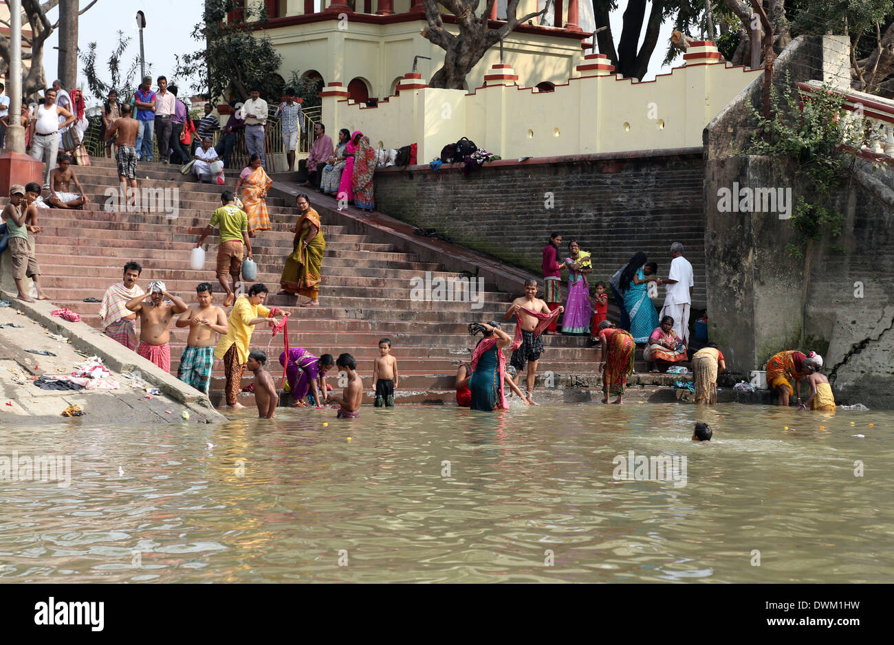 Morning ritual on the Hoogly(Ganges) river in the ghat near the Dakshineswar Kali Temple, Kolkata, West Bengal, India Stock Photo