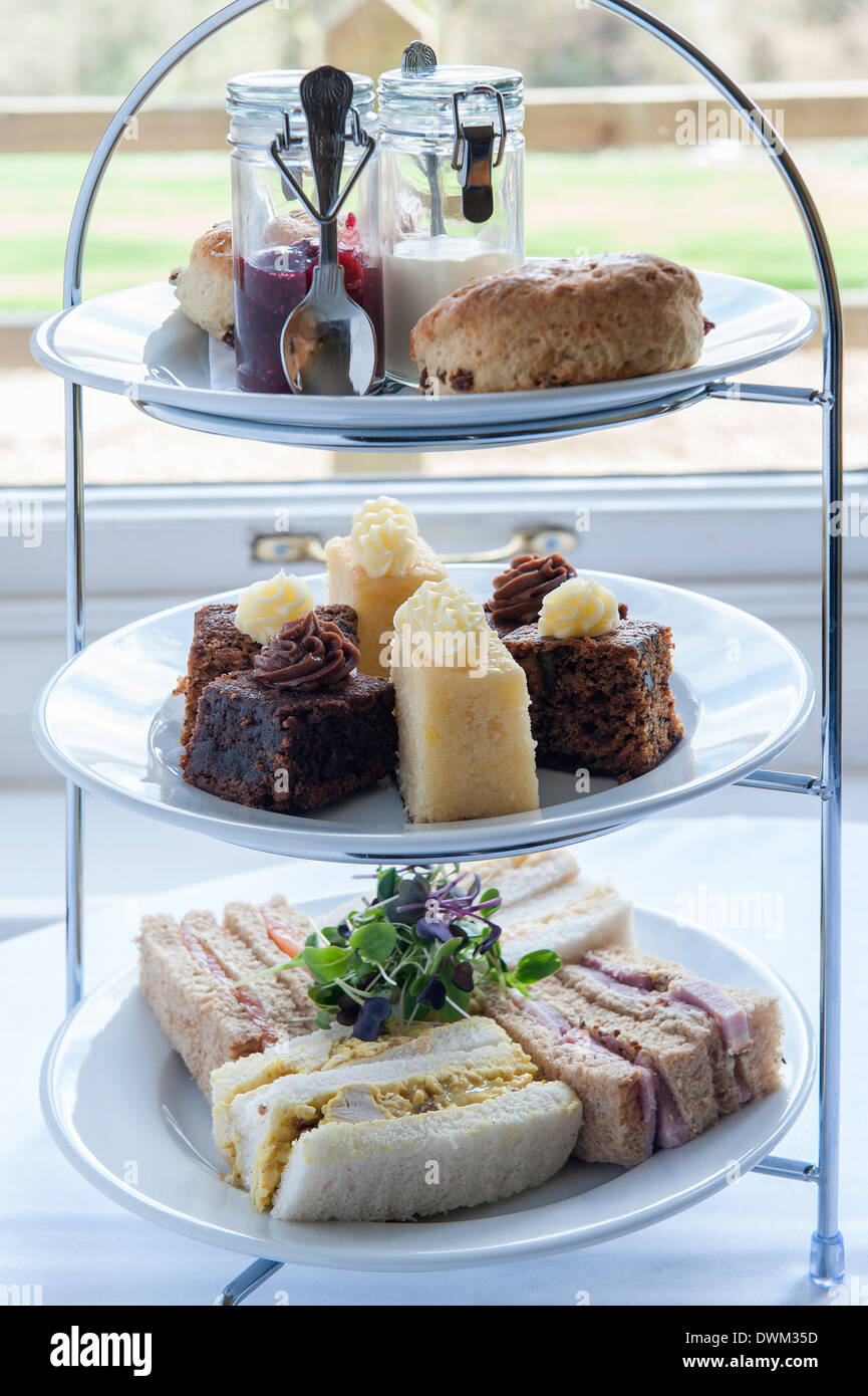 Traditional English Afternoon Cream Tea On Triple Serving Stand Stock Photo Alamy