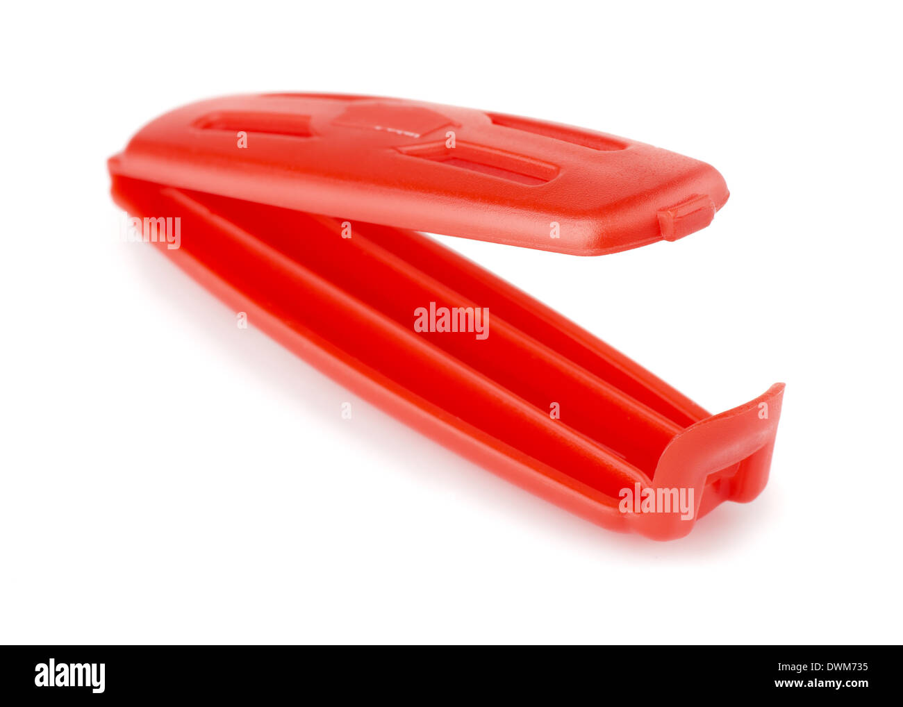 Red plastic food bag clip isolated on white Stock Photo