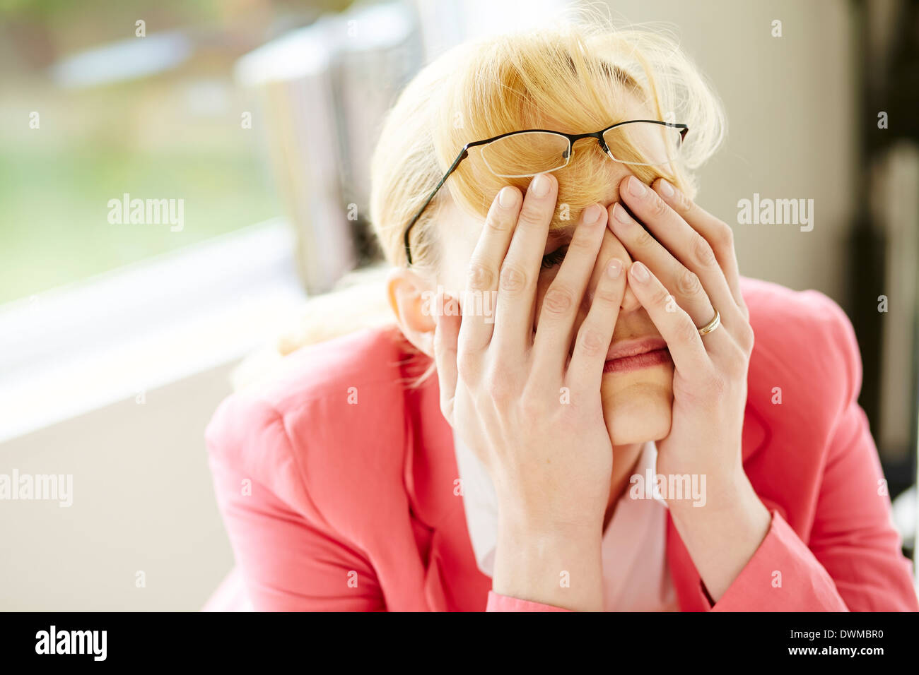 Stressed out businesswoman Stock Photo