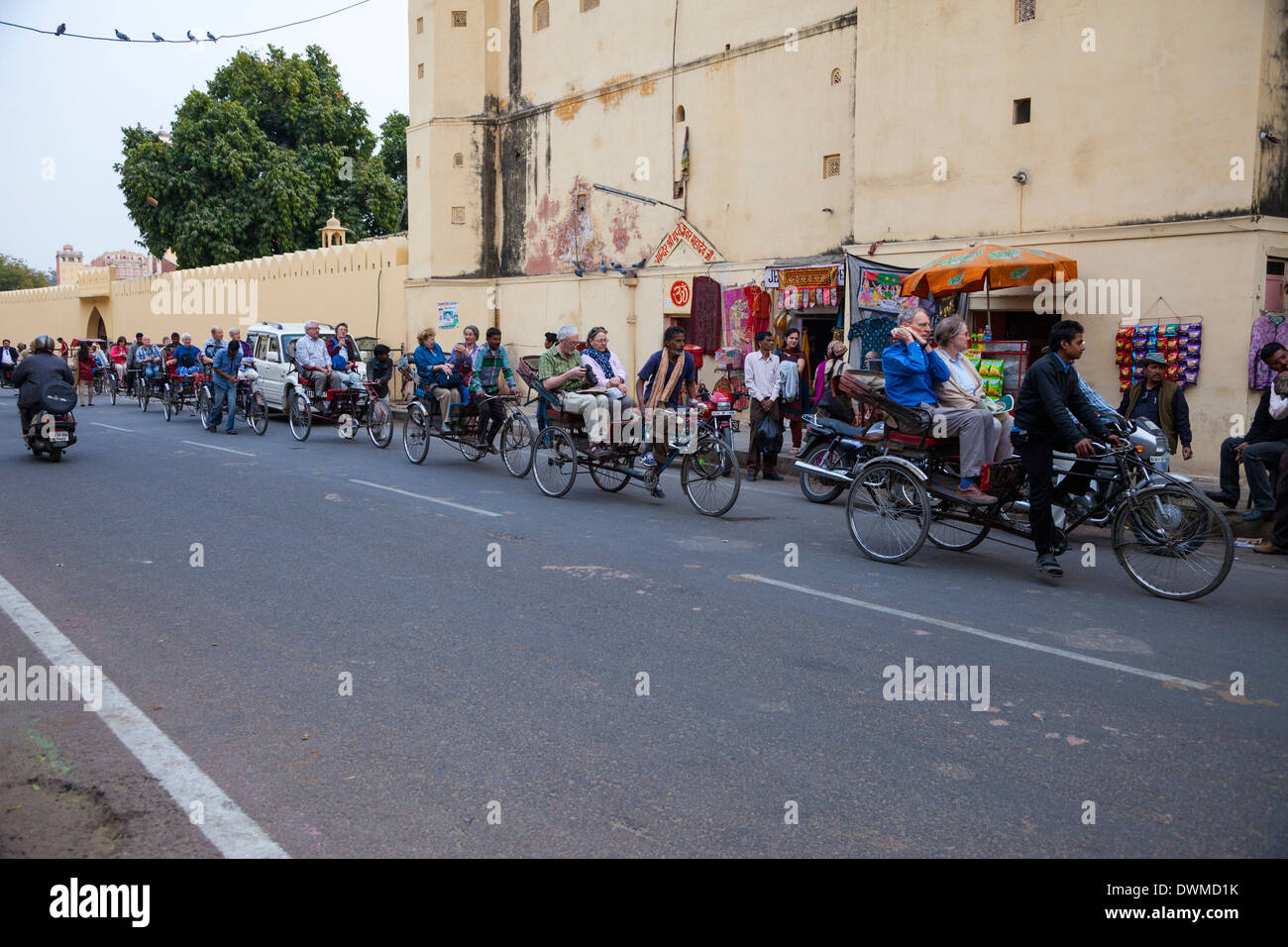 Jaipur, Rajasthan, India. Tourist Caravan of Three-wheeled Bicycle Rickshaws. Stock Photo