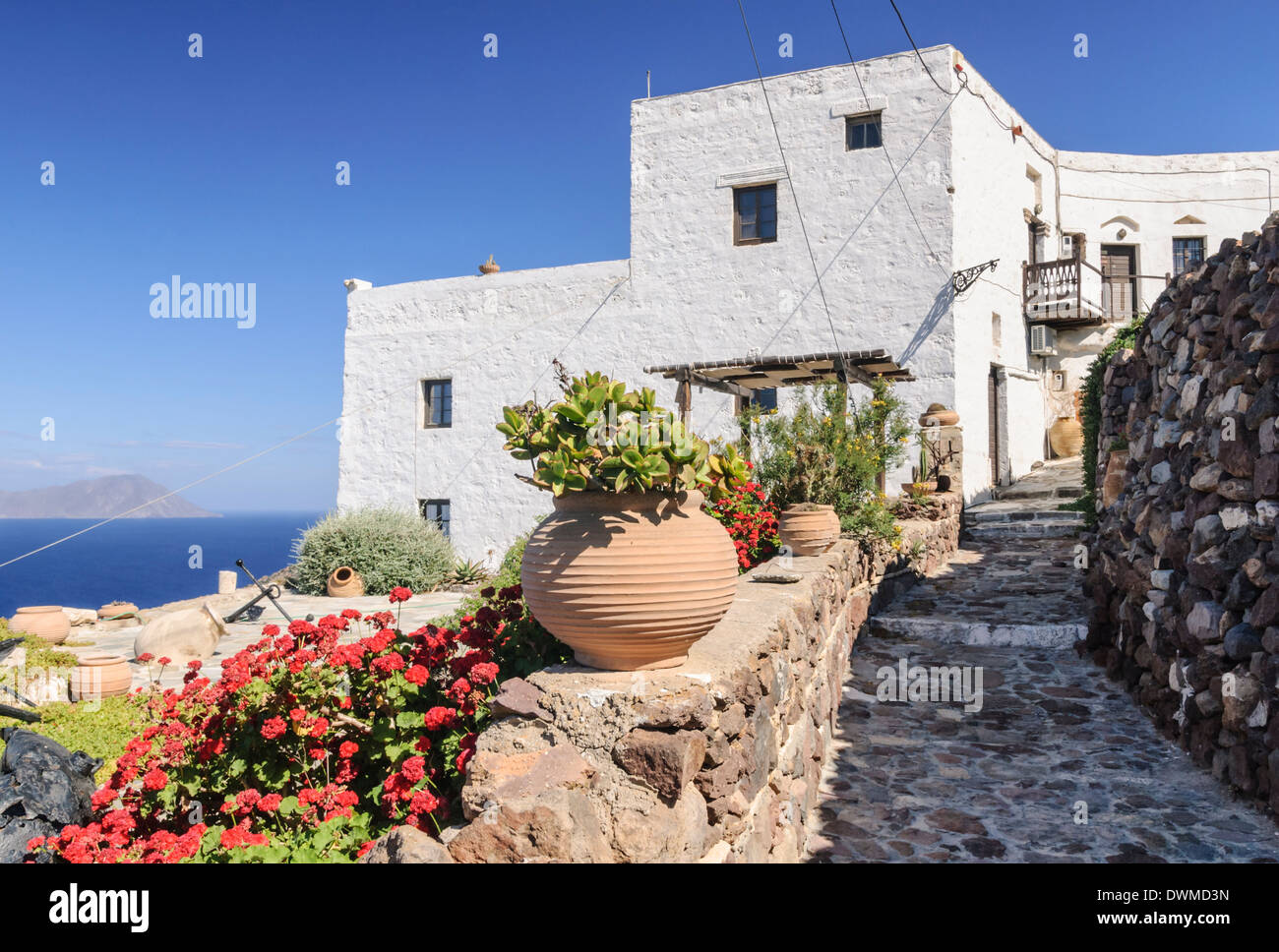 Stone path leading to a whitewashed house in the Plaka, Milos Island, Cyclades, Greece Stock Photo