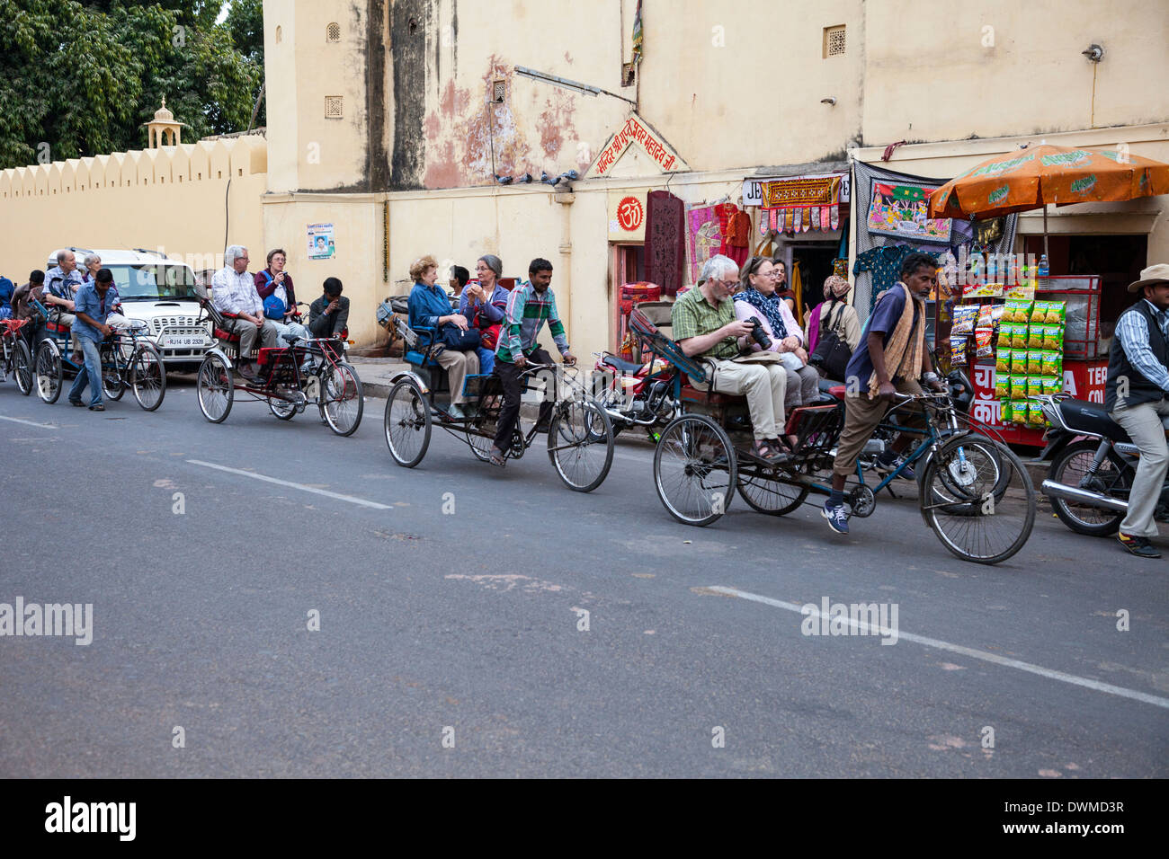 Jaipur, Rajasthan, India. Tourist Caravan of Three-wheeled Bicycle Rickshaws. Stock Photo