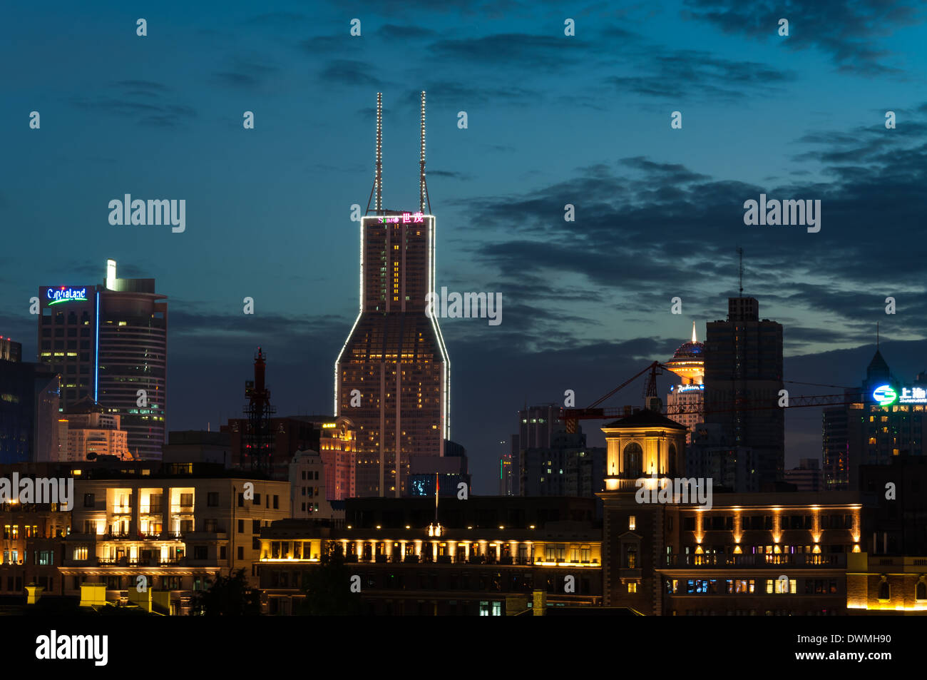 The skyline along the Bund in Shanghai, China, at sunset. Stock Photo