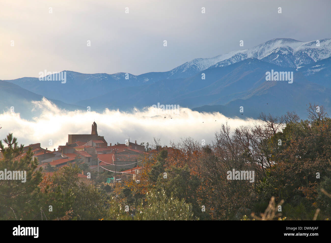 View of morning mist and Arboussols, village in the Pyrenees, Pyrenees-Orientales, Languedoc-Roussillon, France, Europe Stock Photo
