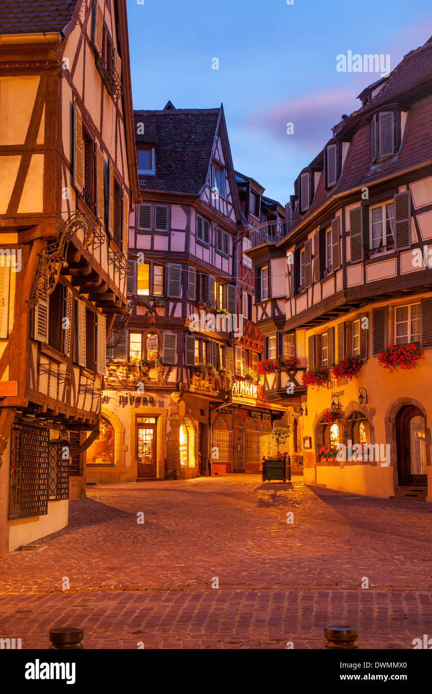 Twilight street scene in Colmar, Alsace, France Stock Photo