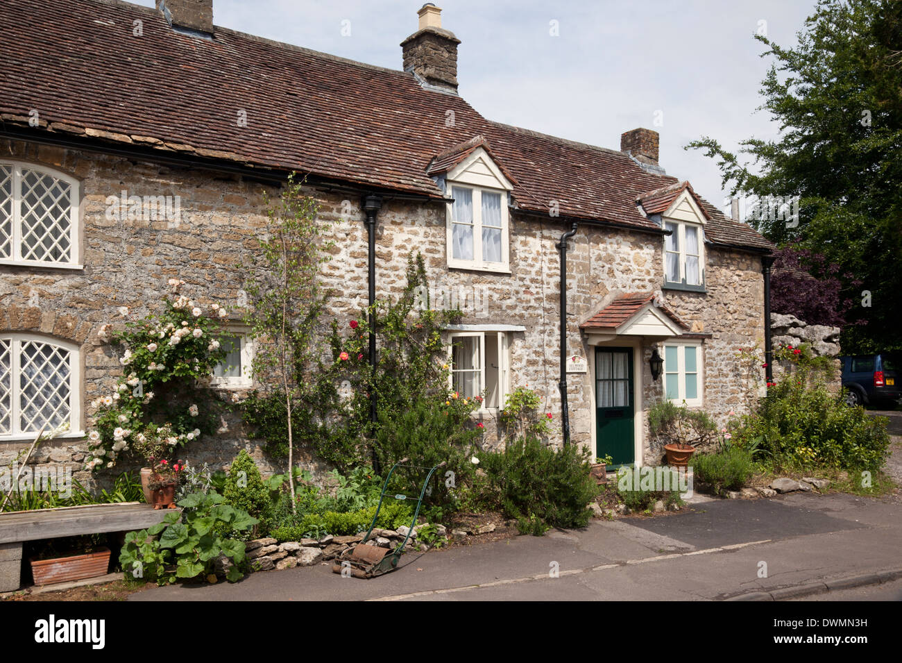 Stone built terrace house in the village of Mells, Someret, England, UK Stock Photo