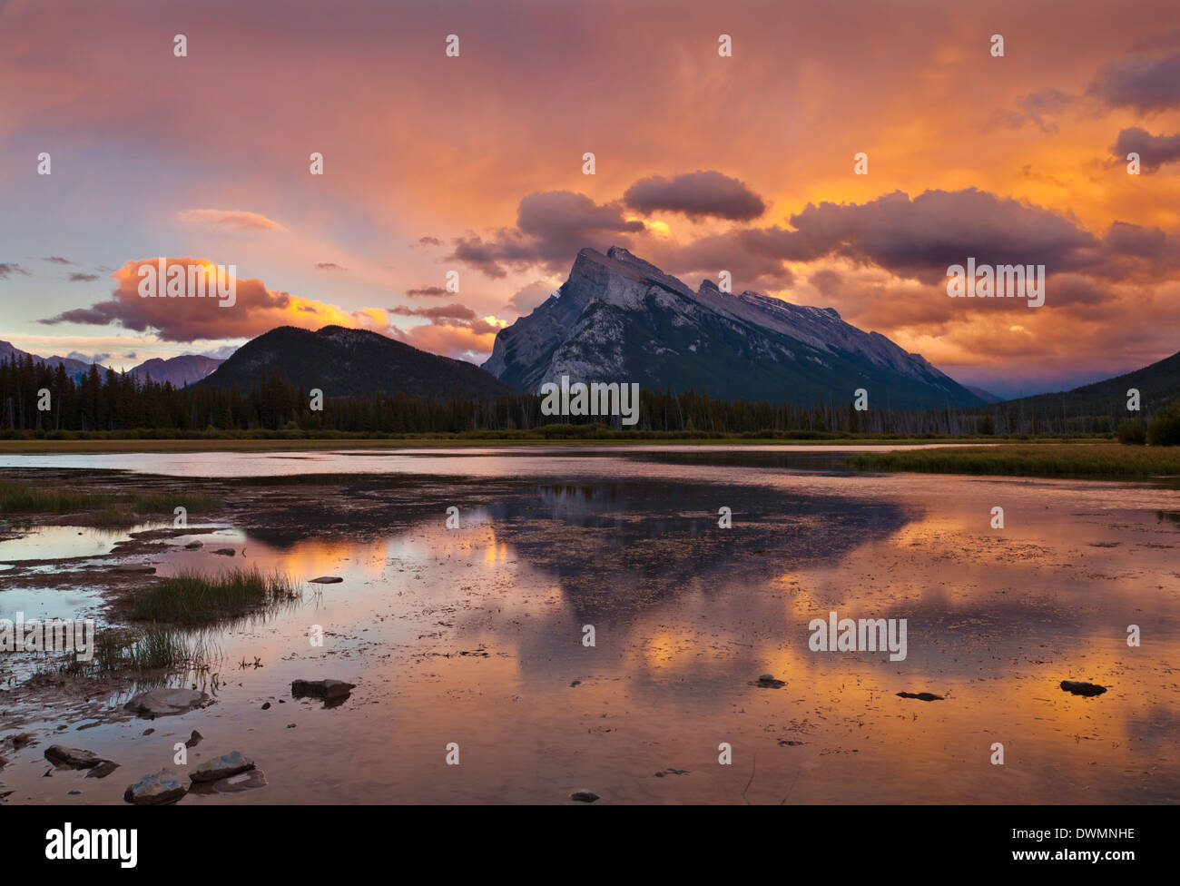 Mount Rundle rising above Vermillion Lakes drive at sunset, Banff National Park, UNESCO Site, Alberta, Canadian Rockies, Canada Stock Photo