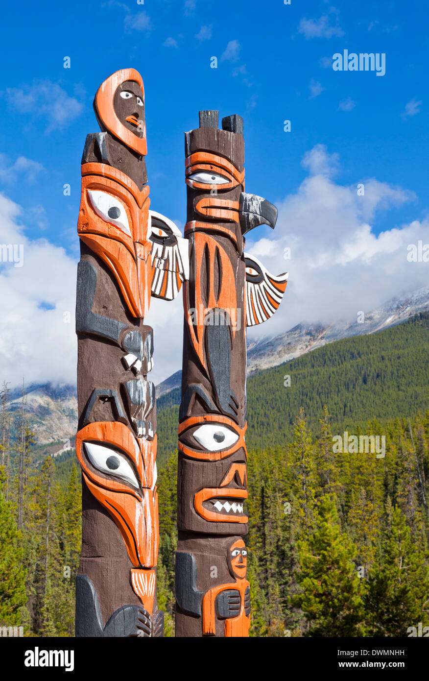 Traditional Canadian native Totem poles at Sunwapta Falls Resort, Jasper National Park, UNESCO Site, Alberta, Canada Stock Photo