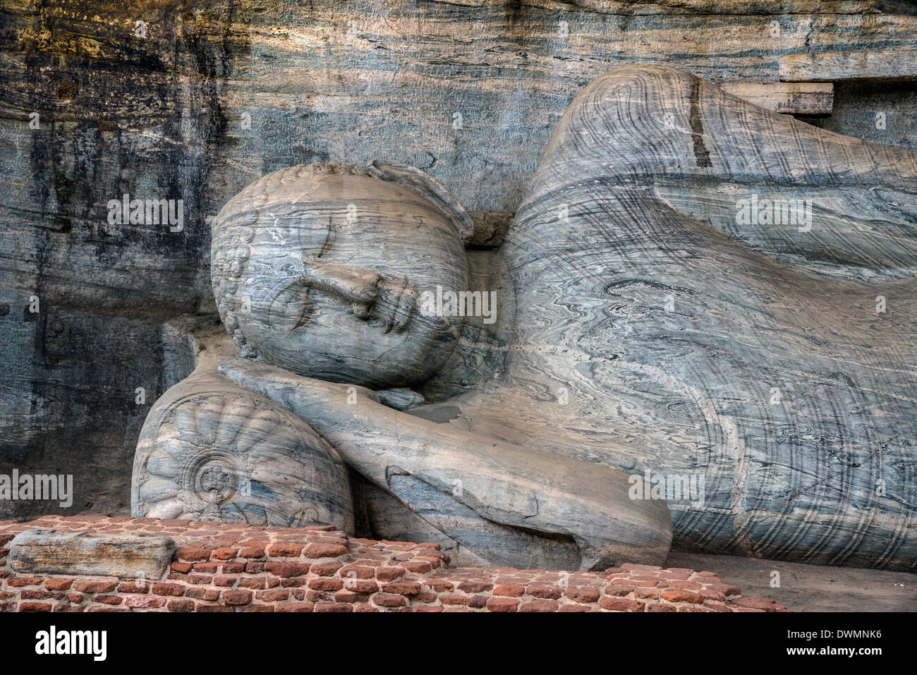 Reclining Buddha depicting the Buddha's parinirvana Gal Vihara rock temple of Buddha in Polonnaruwa Sri Lanka Stock Photo