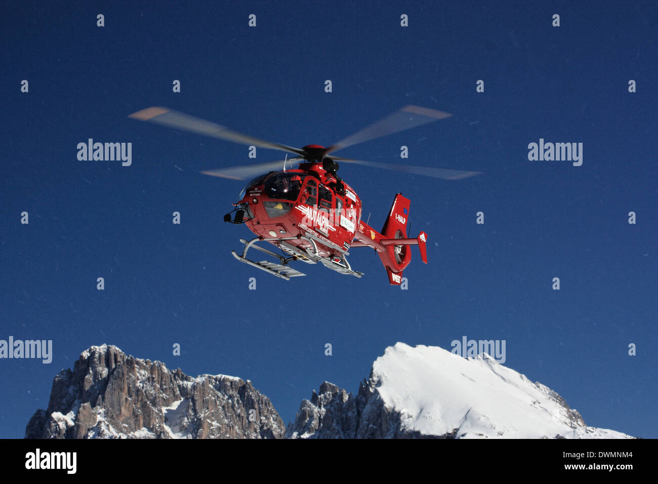 'Aiut Alpin Dolomites' heli mountain rescue, EUROCOPTER EC 135 T2, Seiser Alm / Alpe di Siusi, South Tyrol, Italy Stock Photo