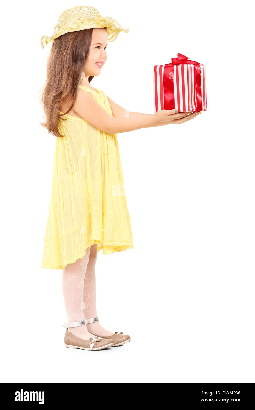 Full length portrait of cute little girl holding a present Stock Photo ...