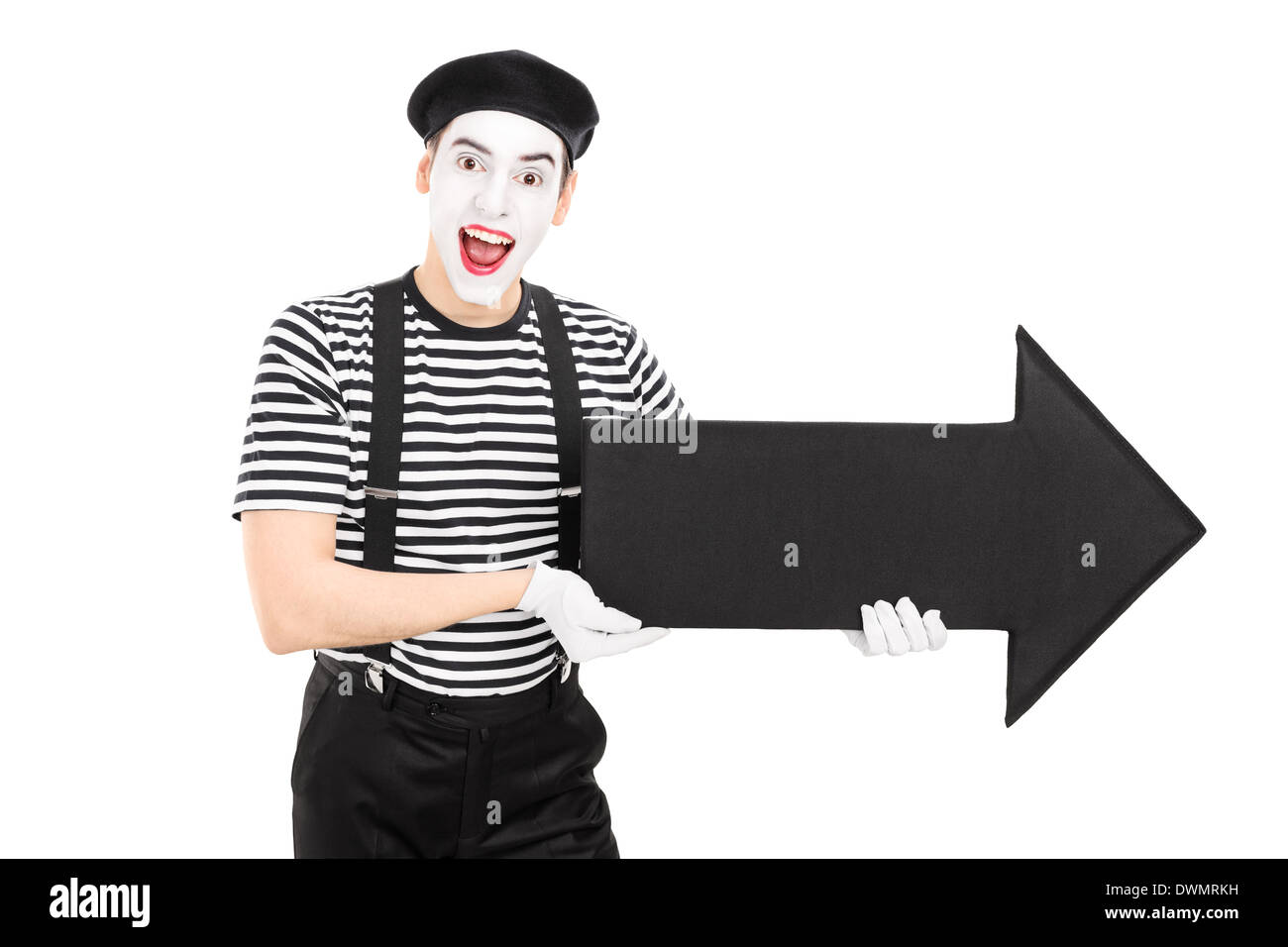 Male comedian holding a big black arrow pointing right Stock Photo - Alamy