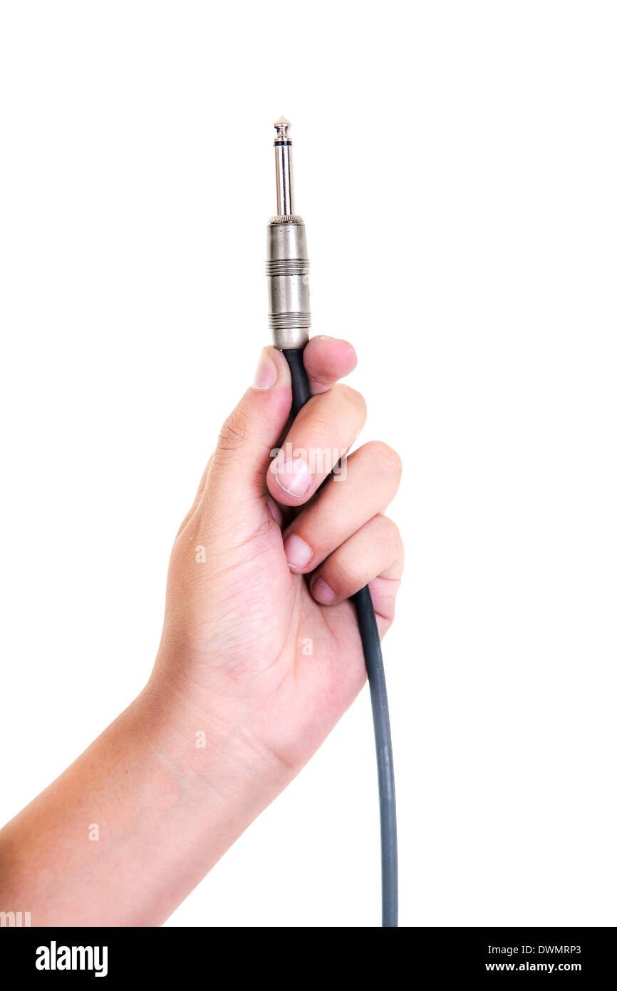 Hand with audio cable Stock Photo