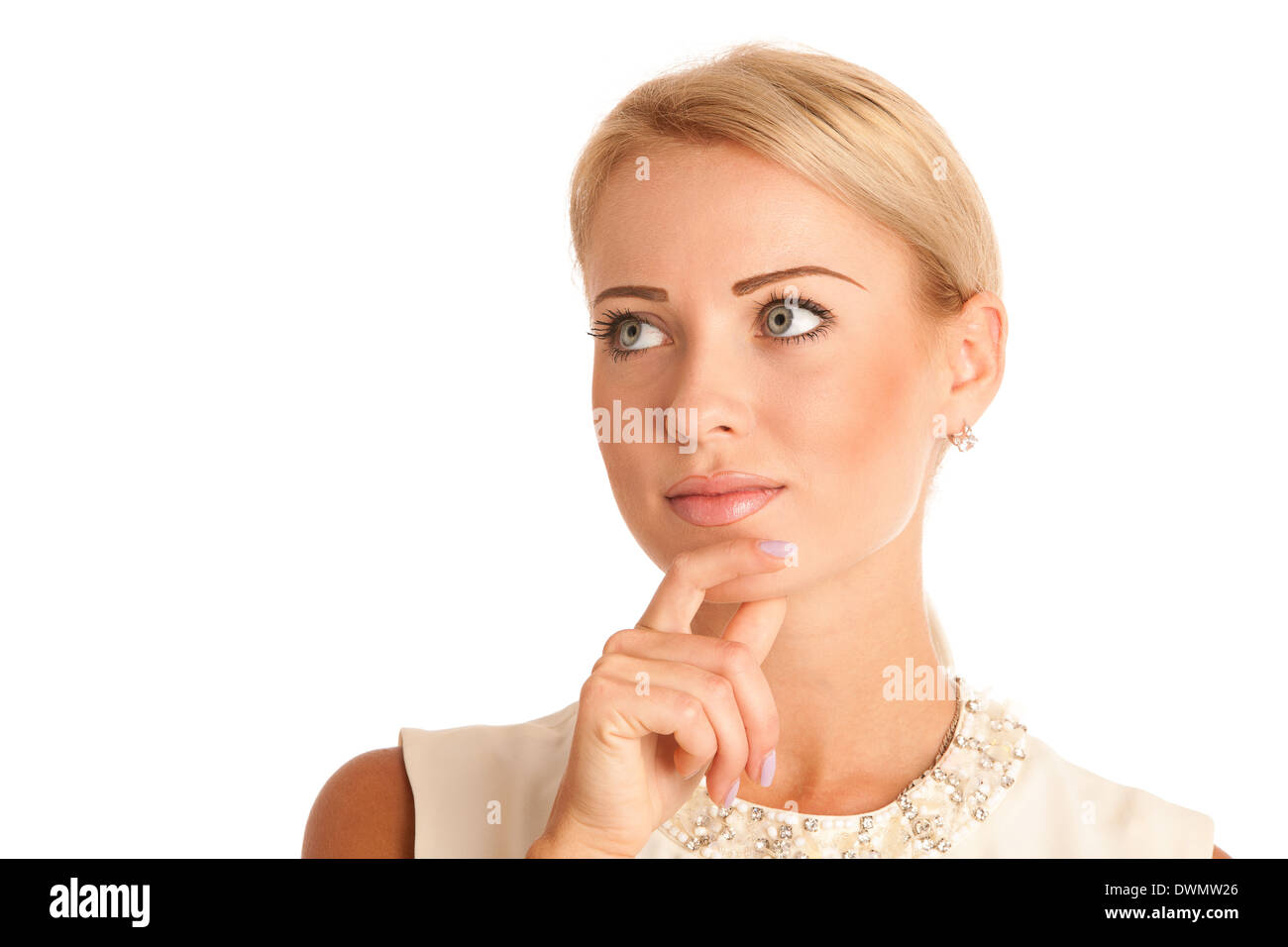 Pensive woman looking into copy space Stock Photo