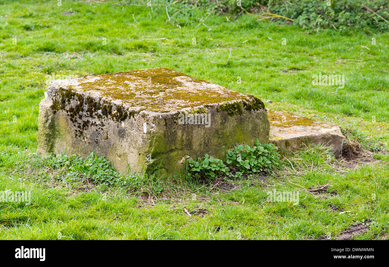 A horse-mounting block at Church End, Kensworth, Bedfordshire, England, UK.  Used to assist mounting and dismounting horses Stock Photo