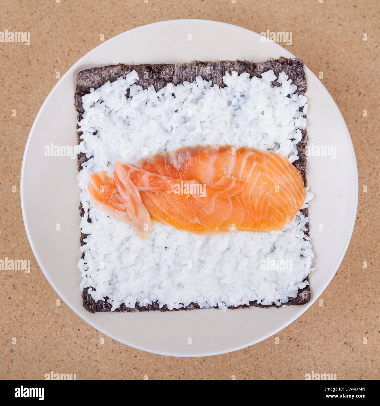 Sushi seaweed with rice and salmon on plate Stock Photo Alamy