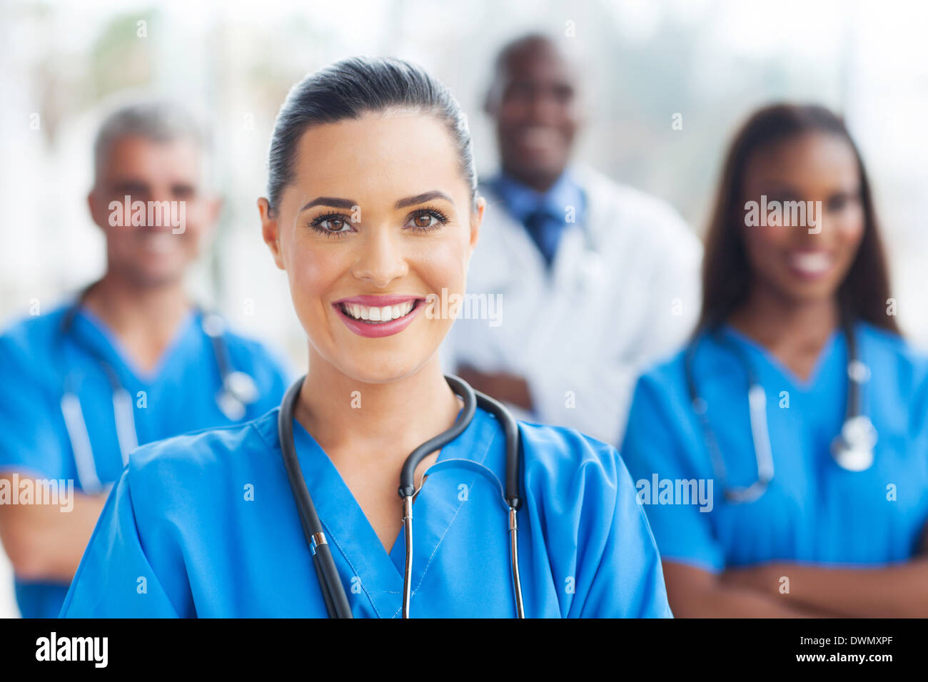 beautiful medical nurse and colleagues in hospital Stock Photo