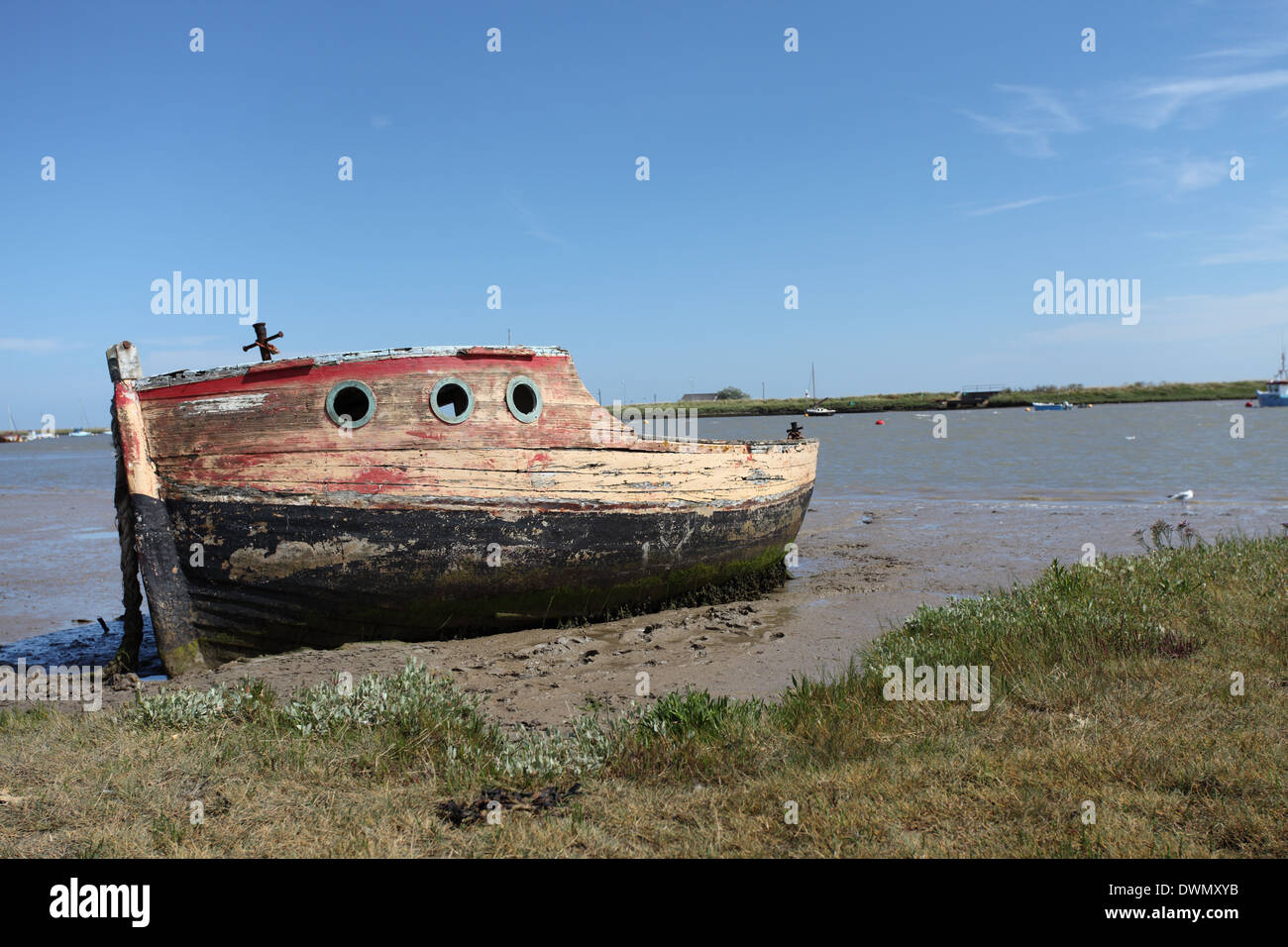 Old abandoned wooden boat on the river Ore, near Orford Quay, Suffolk Stock Photo