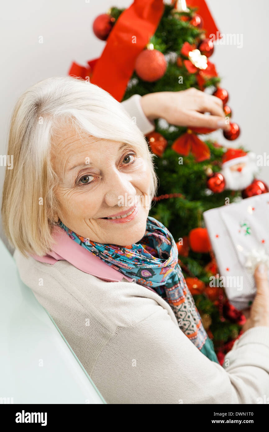Elderly woman christmas tree hi-res stock photography and images - Alamy