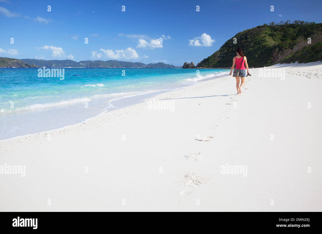 Woman walking on Nishibama Beach, Aka Island, Kerama Islands, Okinawa, Japan, Asia Stock Photo