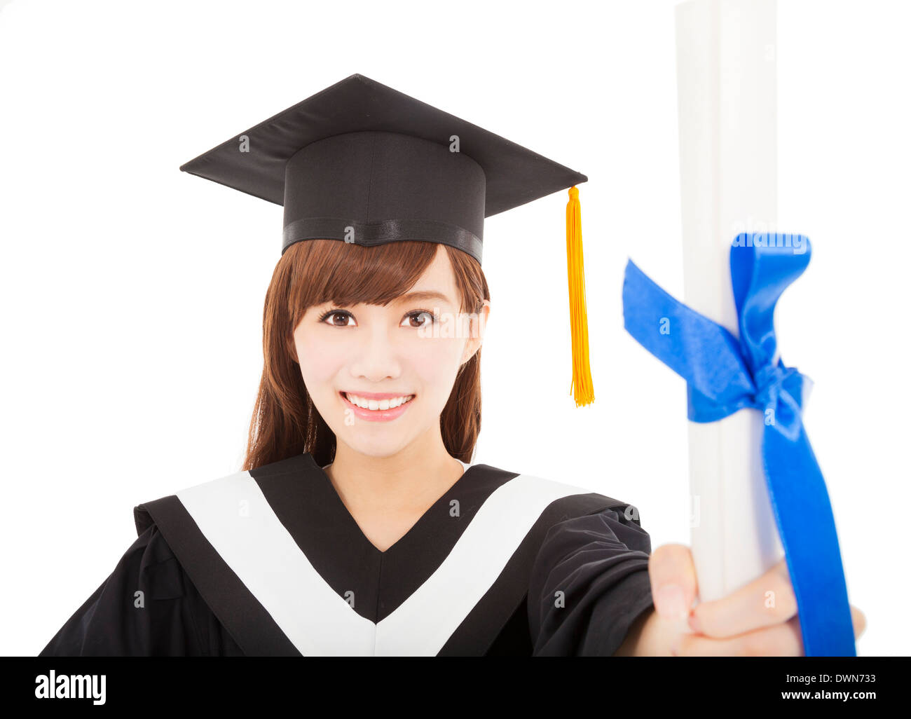 smiling Young graduate girl student holding and showing diploma over white background Stock Photo