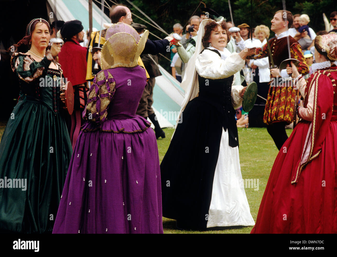 Tudor Period Dancing, late 16th century historical re-enactment, men women dancing Elizabethan dance costume costumes fashion fashions Stock Photo