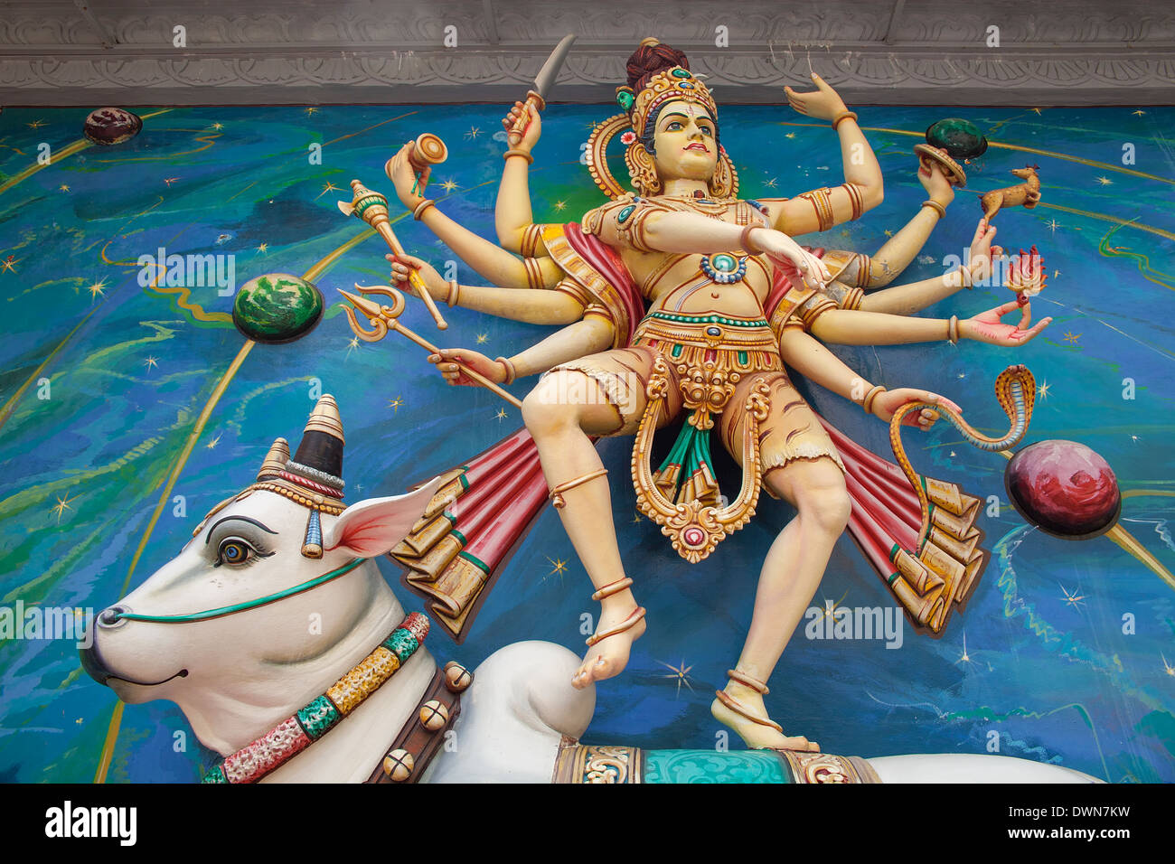 Nataraj Dancing Form of Lord Shiva Hindu God Standing on Sacred Cow on Temple Exterior Wall Stock Photo