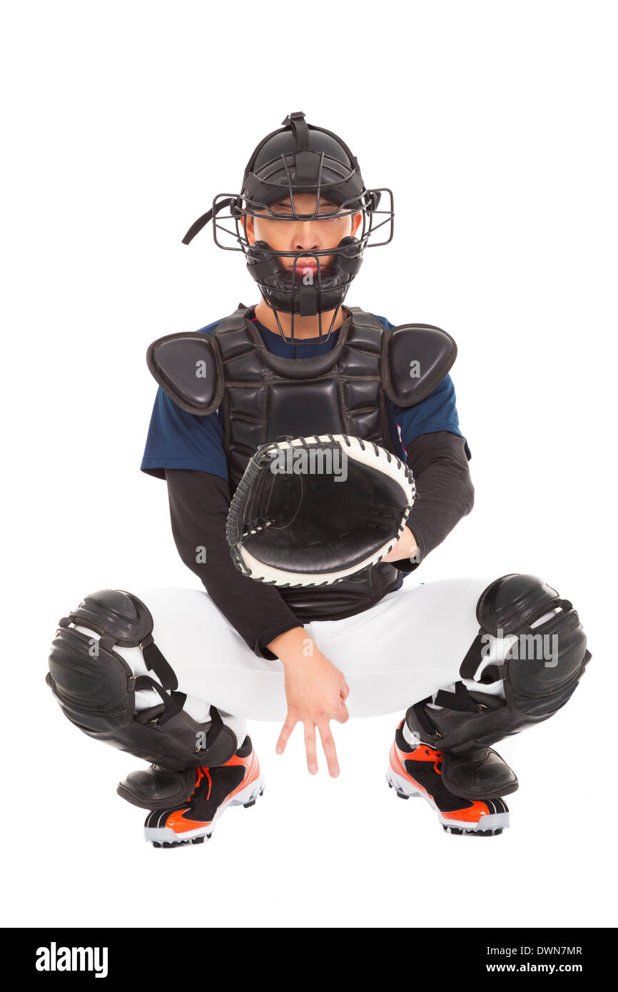 baseball player , catcher showing secret  signal gesture over white Stock Photo