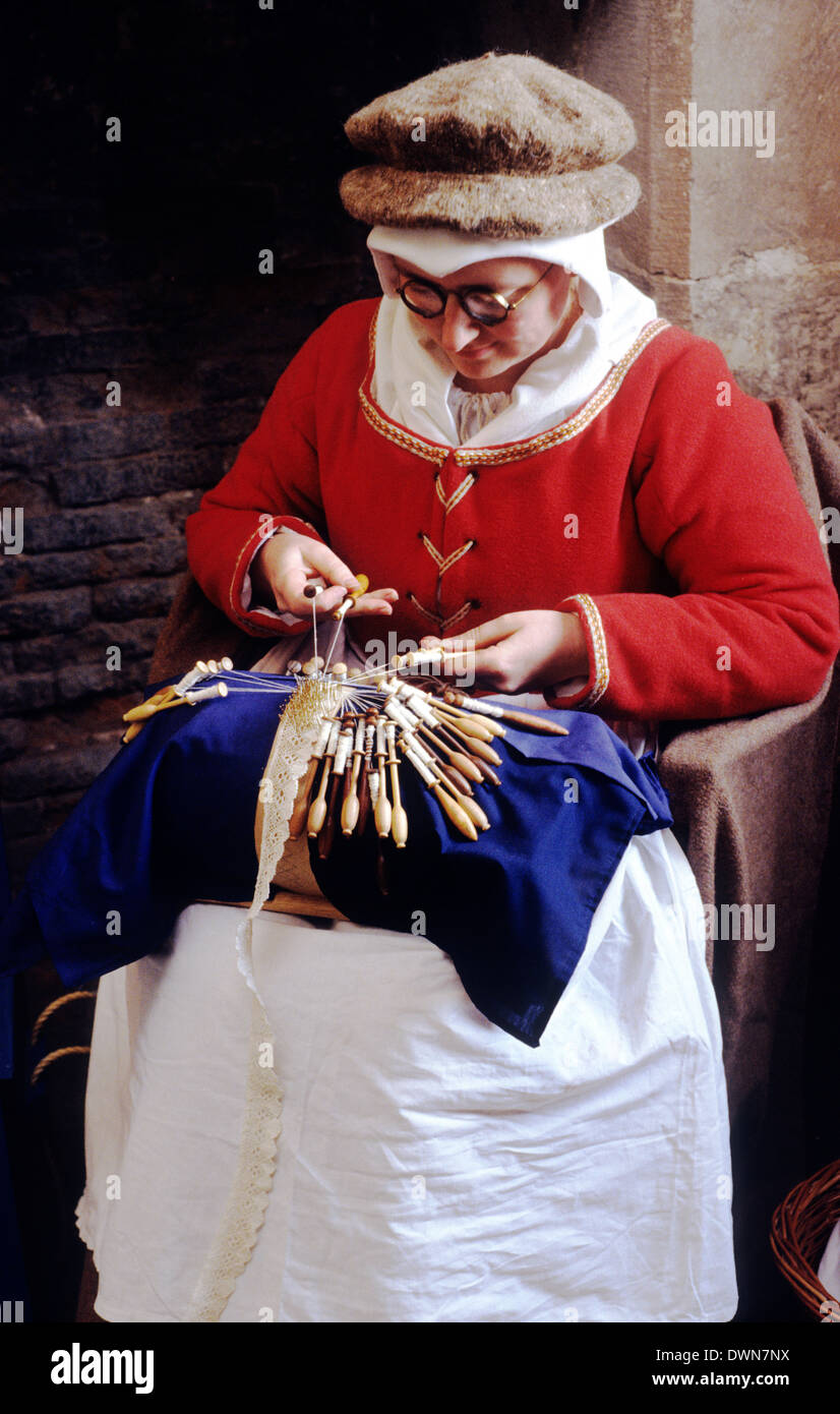 Tudor Period, woman lace making, late 16th century English historical re-enactment women fashion fashions costume costumes England UK domestic labour labours Stock Photo