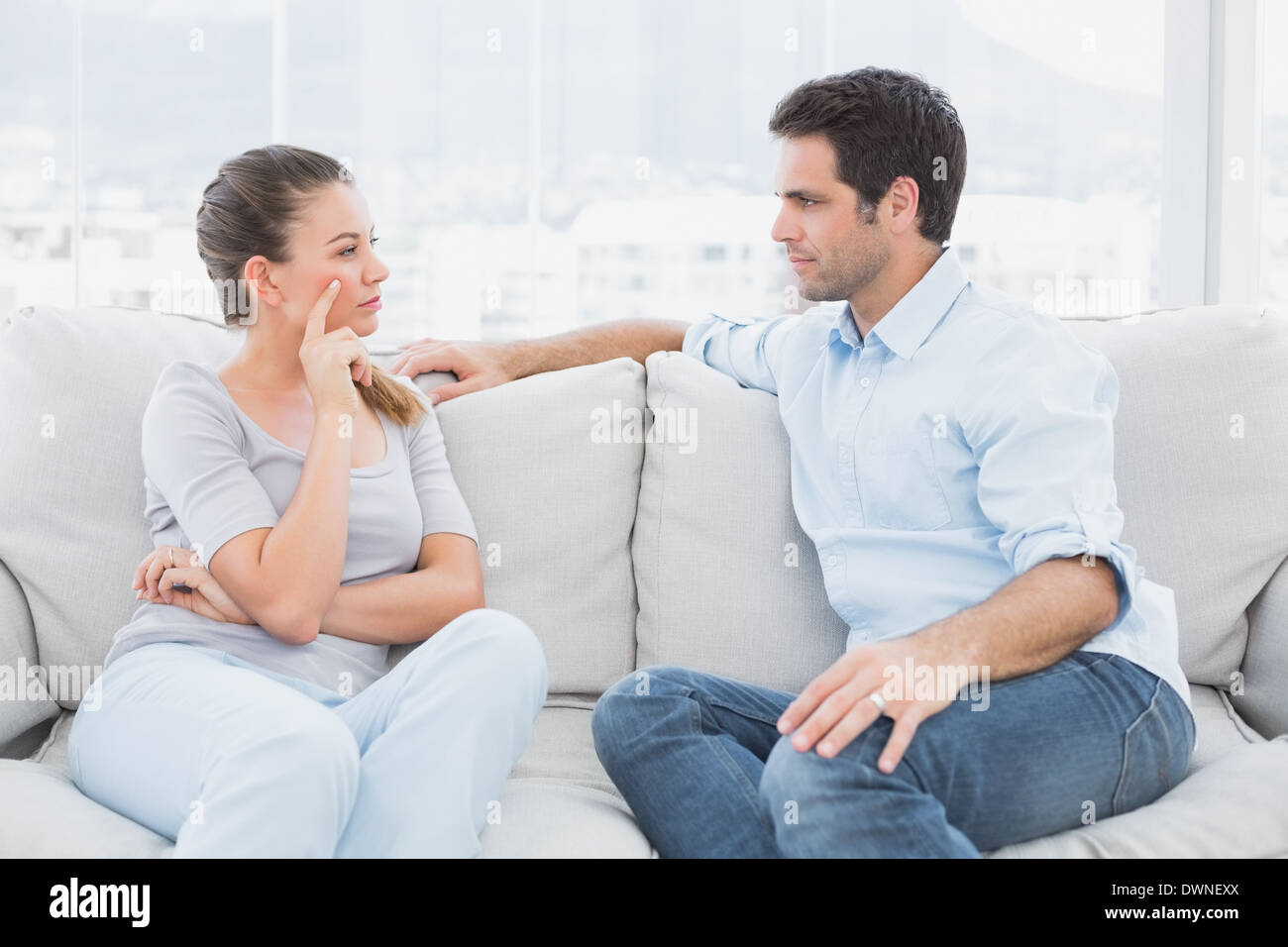 Couple having a serious discussion hires stock photography and images
