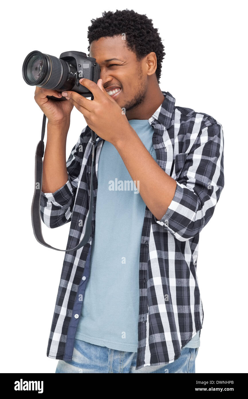 Handsome young man holding dslr hi-res stock photography and images - Alamy