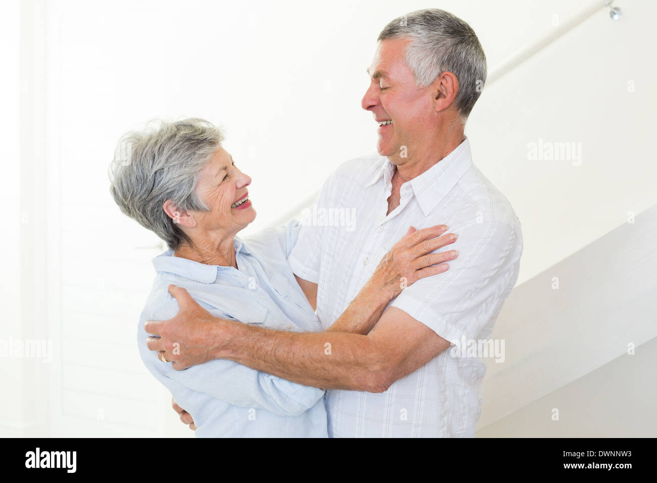 Happy senior couple dancing together Stock Photo
