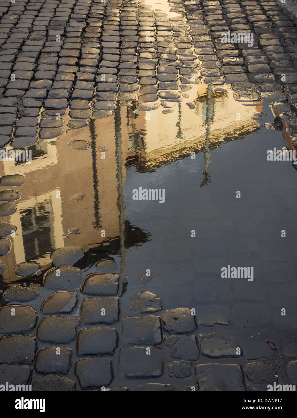 Buildings reflected in a puddle, Piazza della Republica, Rome, Lazio ...